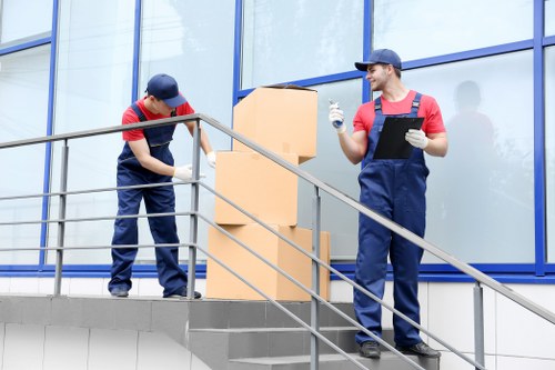 Crew discussing safety checks before loading a van