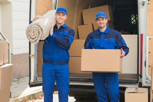 Packed moving boxes ready for transport in a Crayford home