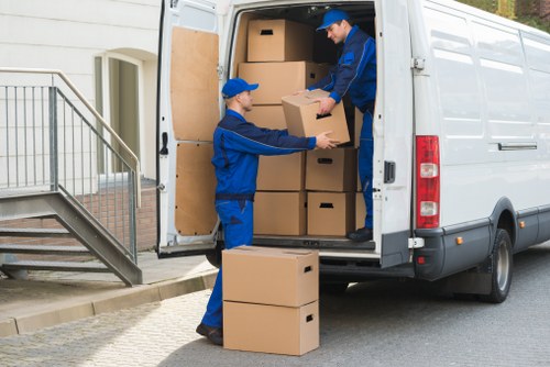 Removal team loading furniture for a house move in Crayford