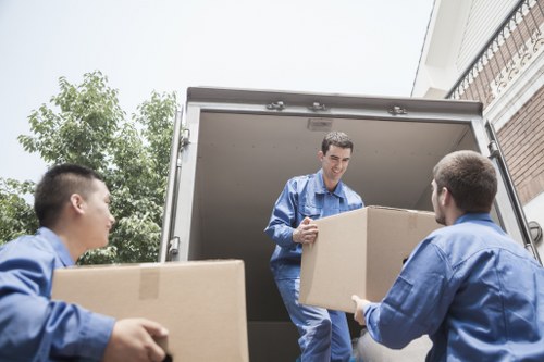 Household boxes and furniture ready for local removals in Crayford
