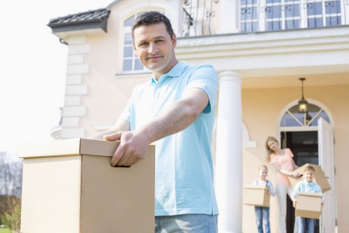 Movers handling stairs and access challenges in a Crayford property