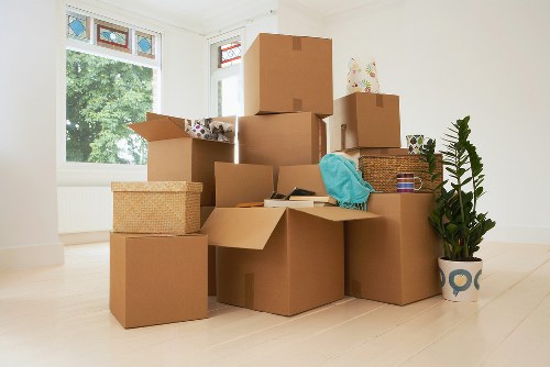 Furniture and boxes being loaded for a home move in Crayford