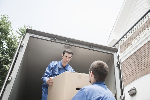 Worker wearing PPE while handling furniture safely