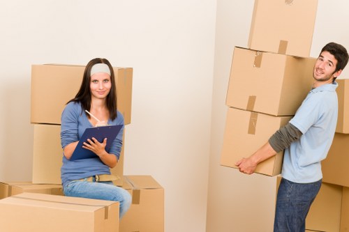 Local moving vehicle helping with furniture transport in Crayford